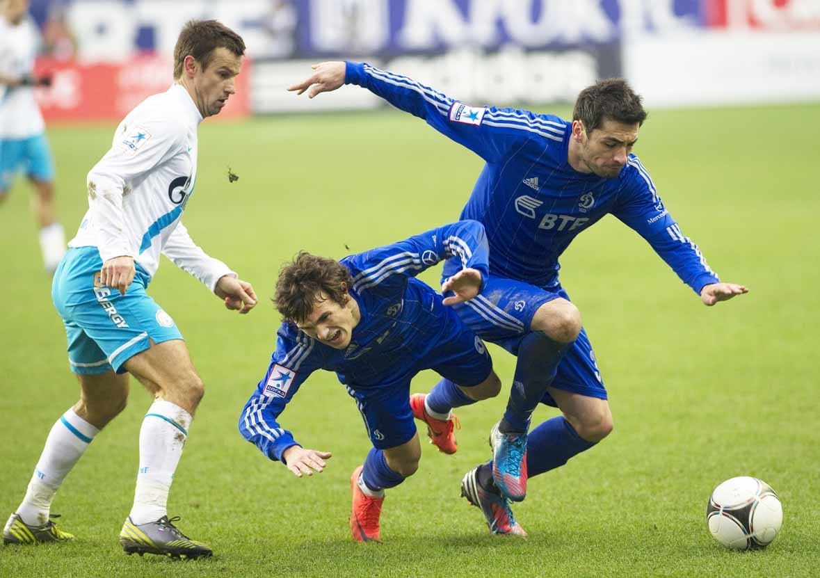 Сергей Семак, Иван Соловьев и Марко Ломич. Футболисты Сергей Семак, Иван Соловьев и Марко Ломич в матче «Динамо» — «Зенит». 2012 год