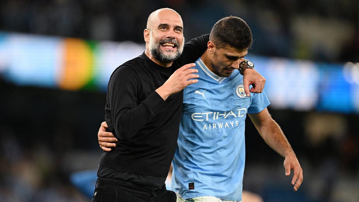 Хосеп Гвардиола и Родри.