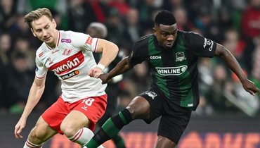 Полузащитник «Спартака» Наиль Умяров и нападающий «Краснодара» Джон Кордоба в матче 14-го тура РПЛ 2 ноября.