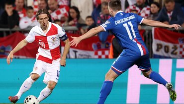 Лука Модрич против Арни Фредериксберга.