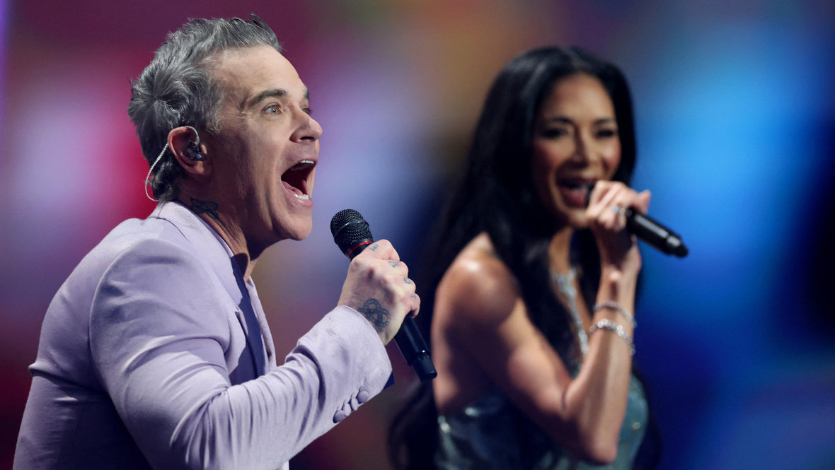 Робби Уильямс и Николь Шерзингер.