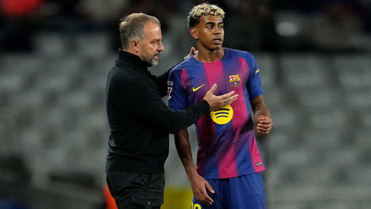 Ханс-Дитер Флик и Ламин Ямаль.