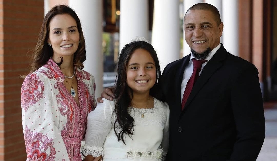 Роберто Карлос и Мариана Лукон с дочерью.