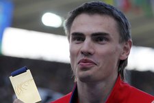 Ярослав РЫБАКОВ с золотой медалью. Фото REUTERS