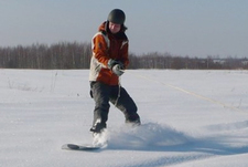 Человек без ноги на сноуборде