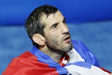 20 августа 2008 года. Пекин. Бувайсар САЙТИЕВ завоевывает свою третью золотую олимпийскую медаль. Фото Александра ВИЛЬФА, "СЭ"