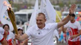 Дмитрий САУТИН во время эстафеты огня Всемирной летней универсиады-2013 в Казани.