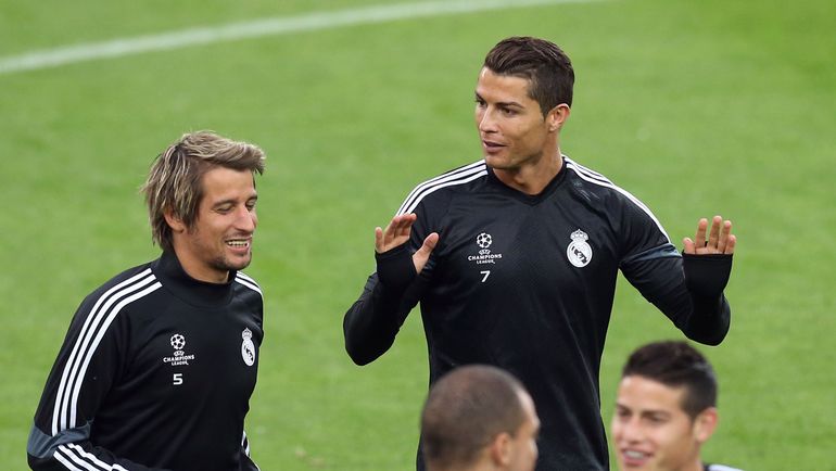 Фабиу КОЭНТРАУ (слева) и КРИШТИАНУ РОНАЛДУ. Фото AFP