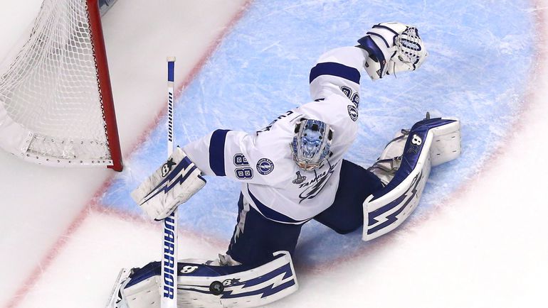 Феноменальная реакция плюс растяжка стали фирменным знаком Андрея ВАСИЛЕВСКОГО. Фото REUTERS