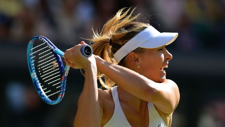 Мария ШАРАПОВА проиграла Серене Уильямс в финале Уимблдона-2015. Фото AFP