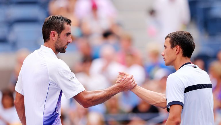 2 сентября. Нью-Йорк. Марин ЧИЛИЧ и Евгений ДОНСКОЙ. Фото AFP
