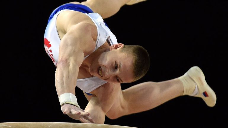 Денис АБЛЯЗИН выполняет опорный прыжок на апрельском чемпионате Европы в Монпелье. Фото AFP Денис АБЛЯЗИН выполняет опорный прыжок на апрельском чемпионате Европы в Монпелье. Фото AFP