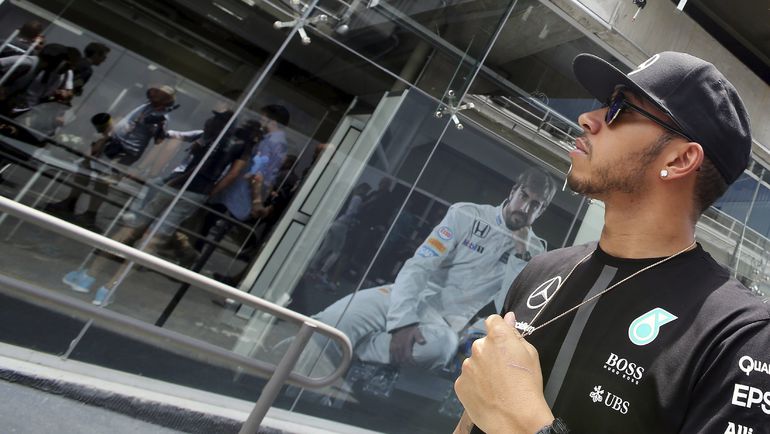 Льюис ХЭМИЛТОН. Фото REUTERS Льюис ХЭМИЛТОН. Фото REUTERS