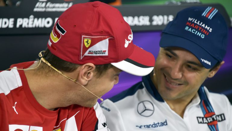 Себастьян ФЕТТЕЛЬ и Фелипе МАССА. Фото AFP Себастьян ФЕТТЕЛЬ и Фелипе МАССА. Фото AFP