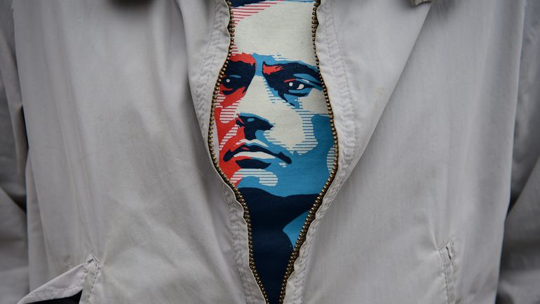 Болельщик в майке с лицом Жозе Моуринью. Фото AFP Болельщик в майке с лицом Жозе Моуринью. Фото AFP