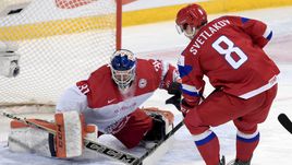 Сегодня. Хельсинки. Россия – Дания – 4:3 ОТ. Ворота датчанина Томаса ЛИЛЛИ атакует нападающий Андрей СВЕТЛАКОВ.