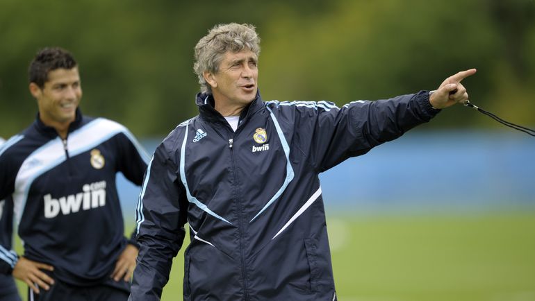 Мануэль ПЕЛЛЕГРИНИ и Криштиану РОНАЛДУ. Фото AFP Мануэль ПЕЛЛЕГРИНИ и Криштиану РОНАЛДУ. Фото AFP