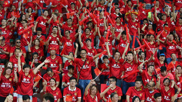 Футбол становится популярным видом спорта в самой большой по численности населения стране. Фото REUTERS Футбол становится популярным видом спорта в самой большой по численности населения стране. Фото REUTERS