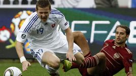 Юрай КУЦКА и капитан сборной России Роман ШИРОКОВ.