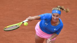 Воскресенье. Париж. Светлана КУЗНЕЦОВА в матче с Гарбинье Мугурусой.