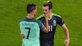 Среда. Лион. Португалия - Уэльс - 2:0. Криштиану РОНАЛДУ (слева) и Гарет БЭЙЛ.
