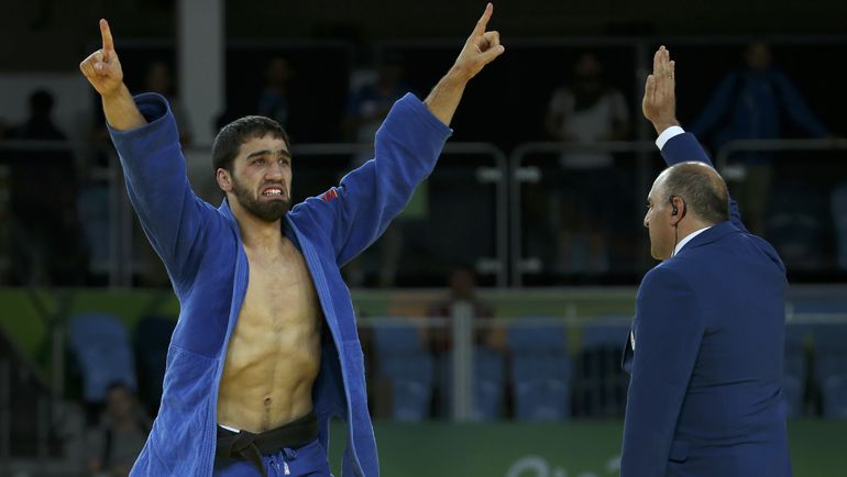 Хасан ХАЛМУРЗАЕВ - чемпион! Фото REUTERS Хасан ХАЛМУРЗАЕВ - чемпион! Фото REUTERS