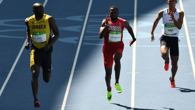 Бег Усэйна БОЛТА (слева). Фото AFP Бег Усэйна БОЛТА (слева). Фото AFP