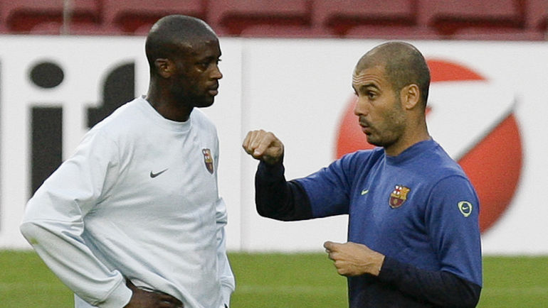 Яя ТУРЕ и Хосеп ГВАРДЬОЛА. Фото AFP Яя ТУРЕ и Хосеп ГВАРДЬОЛА. Фото AFP