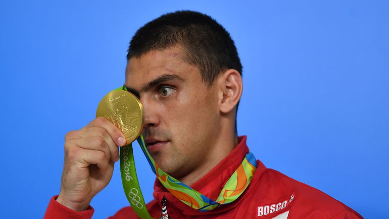 Евгений ТИЩЕНКО с золотой медалью. Фото AFP Евгений ТИЩЕНКО с золотой медалью. Фото AFP