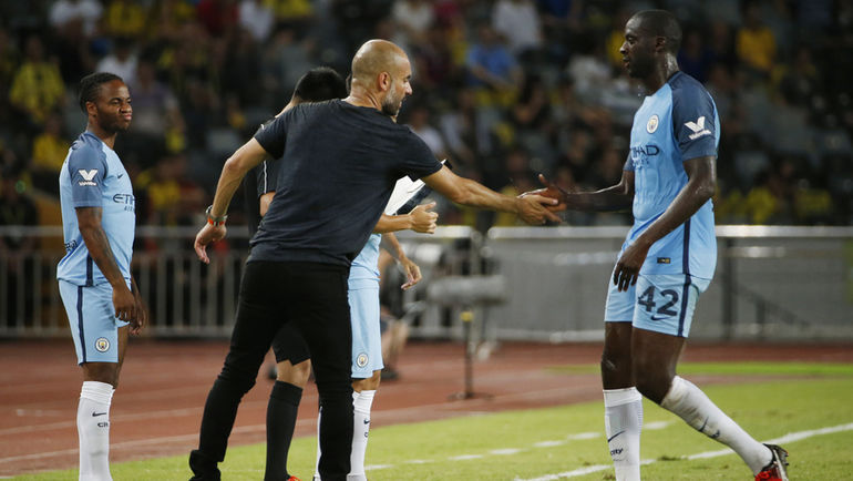 Хосеп ГВАРДЬОЛА (слева) и Яя ТУРЕ (№42). Фото REUTERS Хосеп ГВАРДЬОЛА (слева) и Яя ТУРЕ (№42). Фото REUTERS