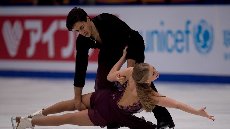 Кейтлин УИВЕР и Эндрю ПОЖЕ. Фото AFP Кейтлин УИВЕР и Эндрю ПОЖЕ. Фото AFP