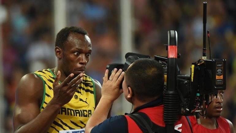 2015 год. Пекин. Усэйн БОЛТ - снова первый. Фото AFP 2015 год. Пекин. Усэйн БОЛТ - снова первый. Фото AFP