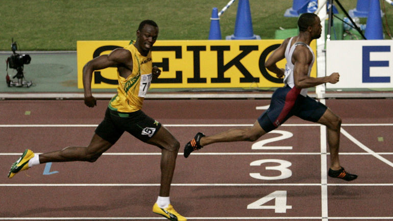 2007 год. Усэйн БОЛТ уступает Тайсону ГЭЮ на финише в Осаке. Фото REUTERS 2007 год. Усэйн БОЛТ уступает Тайсону ГЭЮ на финише в Осаке. Фото REUTERS
