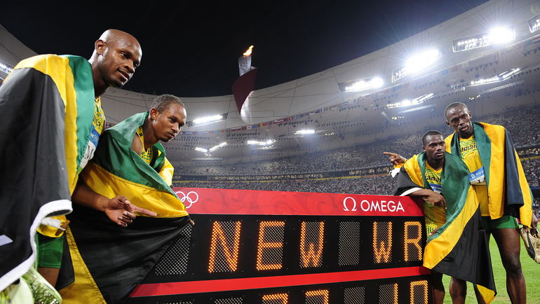 22 августа 2008 года. Пекин. Олимпийские чемпионы-2008 Асафа ПАУЭЛЛ, Майкл ФРЭЙТЕР, Неста КАРТЕР и Усэйн БОЛТ (слева направо). Фото AFP 22 августа 2008 года. Пекин. Олимпийские чемпионы-2008 Асафа ПАУЭЛЛ, Майкл ФРЭЙТЕР, Неста КАРТЕР и Усэйн БОЛТ (слева направо). Фото AFP