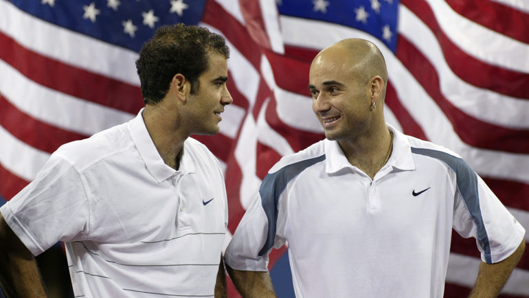 8 сентября 2002 года. Нью-Йорк. Пит САМПРАС (слева) и Андре АГАССИ после финала US Open. Фото AFP 8 сентября 2002 года. Нью-Йорк. Пит САМПРАС (слева) и Андре АГАССИ после финала US Open. Фото AFP