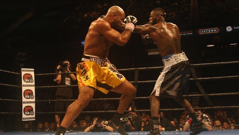 Деонтей УАЙДЕР (справа) против Джеральда ВАШИНГТОНА. Фото AFP Деонтей УАЙДЕР (справа) против Джеральда ВАШИНГТОНА. Фото AFP