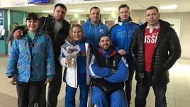 Замир ШКАХОВ - в центре.