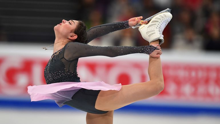 31 марта. Хельсинки. Золотой прокат Евгении МЕДВЕДЕВОЙ. Фото AFP 31 марта. Хельсинки. Золотой прокат Евгении МЕДВЕДЕВОЙ. Фото AFP