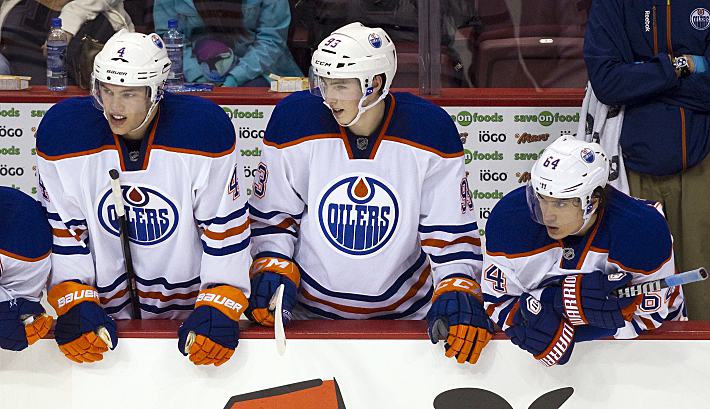 Тайлер ХОЛЛ, Райан НЮДЖЕНТ-ХОПКИНС и Наиль ЯКУПОВ. Фото - REUTERS