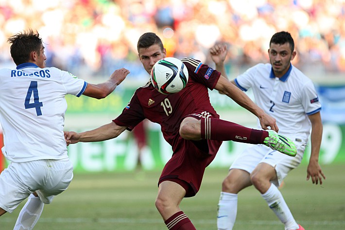 Алексей ГАСИЛИН (в центре). Фото - AFP