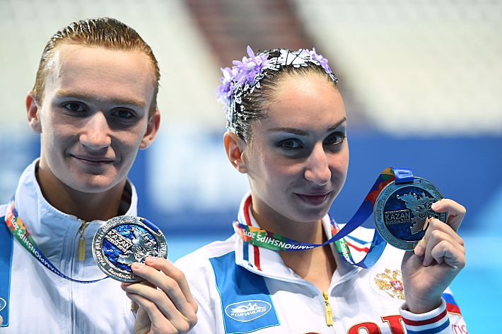 26 июля, Казань. Александр МАЛЬЦЕВ и Дарина ВАЛИТОВА. Фото AFP